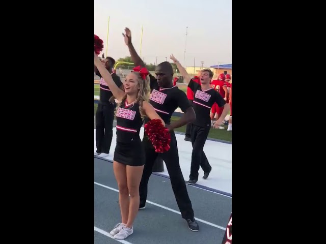 Cheerleader Gets Into the Groove During Game