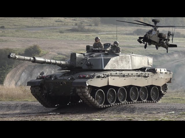 Challenger 2 battle tanks, Apache attack helicopters, and pickup trucks with guns 🪖