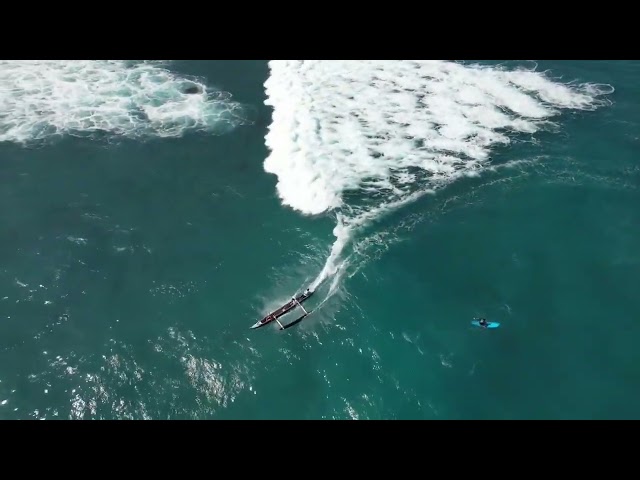 'Canoe Surfing' Group Catch Some Waves Off Hawaiian Coastline