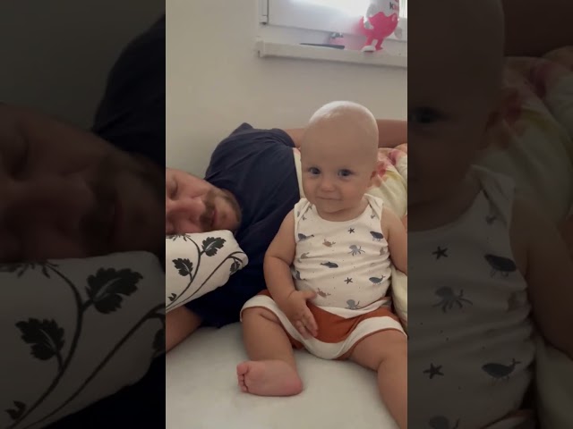Baby Has Hilarious Reaction to Dad Snoring