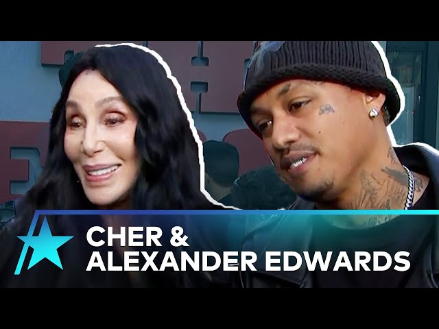 Cher Jokes Boyfriend Alexander Edwards STOLE Her Beanie For ‘Bikeriders’ Premiere