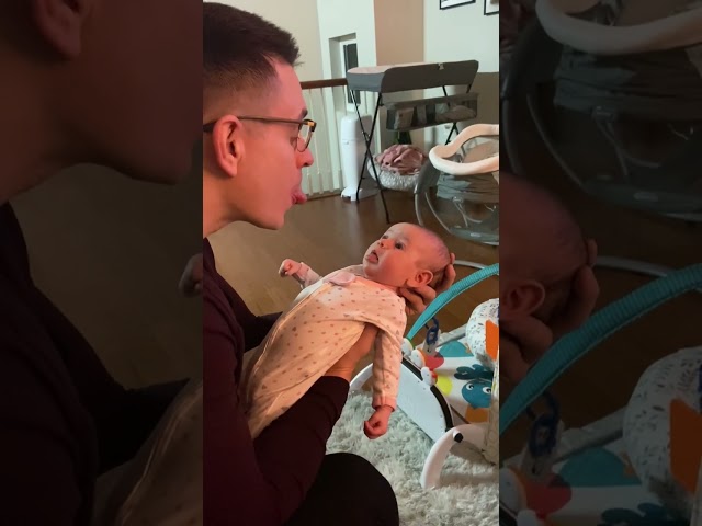 Eight-week-old Baby Tries Her Best to Mimic Dad