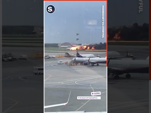 Flaming Plane Speeds Down Runway