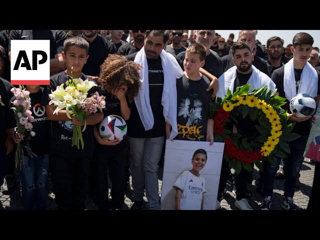 Community in Israeli-controlled Golan Heights holds funerals for people killed in rocket attack