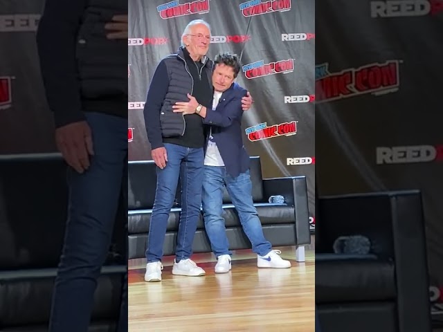 Michael J. Fox and Christopher Loyd Share Hug at Comic Con 2022