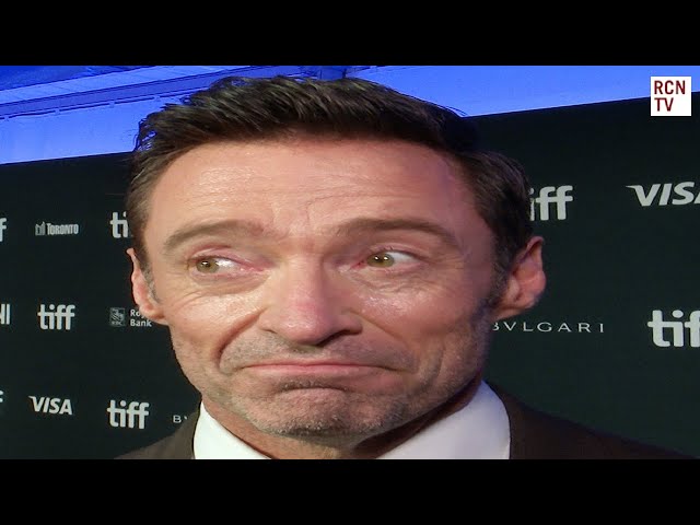 Hugh Jackman Adopts A Journalist On The Red Carpet