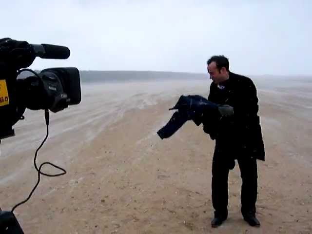 Trying to film presenter piece in a blizzard