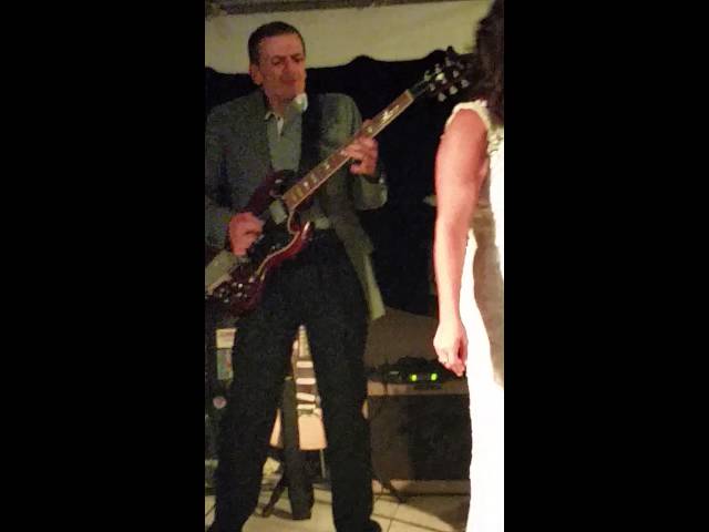 Bride sings Led Zeppelin's  "Rock and Roll"