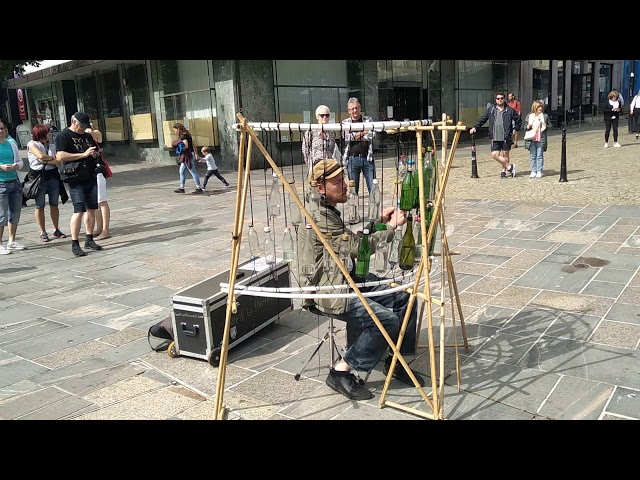 Fedor grigorev bottle pianist - street music. Playing on Bottles in Bergen Norway. Gra na butelkach